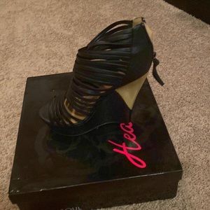 Gently used, black strappy wedge sandal
